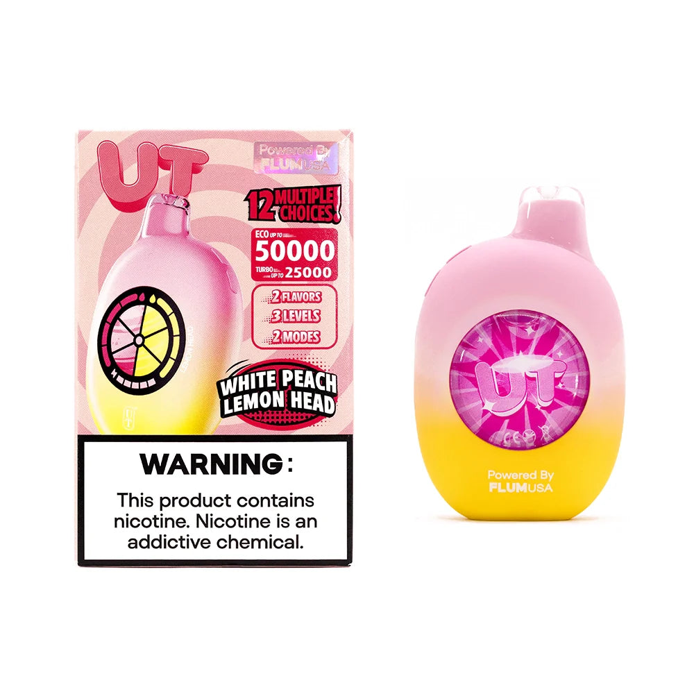 Front view of a pink and yellow vape device with packaging showing "UT" logo, "White Peach Lemon Head" flavor, and nicotine warning label.